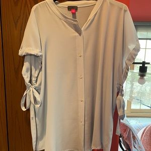 Light blue blouse - cute ties on the sleeves - hidden front buttons